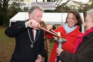 Savitri MacCuish and Mayor Gebben light the Oosterbeek World Peace Flame