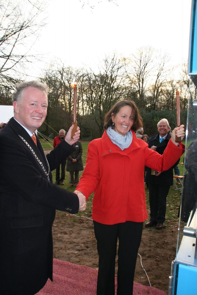 Savitri MacCuish and Mayor Gebben light the Oosterbeek World Peace Flame